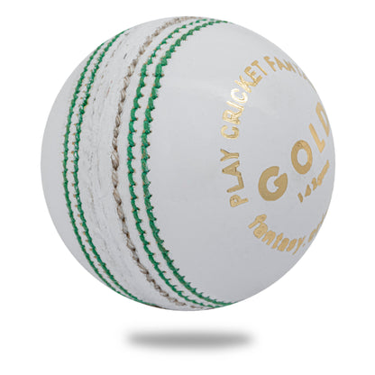 Cricnix white leather cricket ball with green stitching and gold text, featuring the brand name 'Cricnix Gold' prominently displayed.