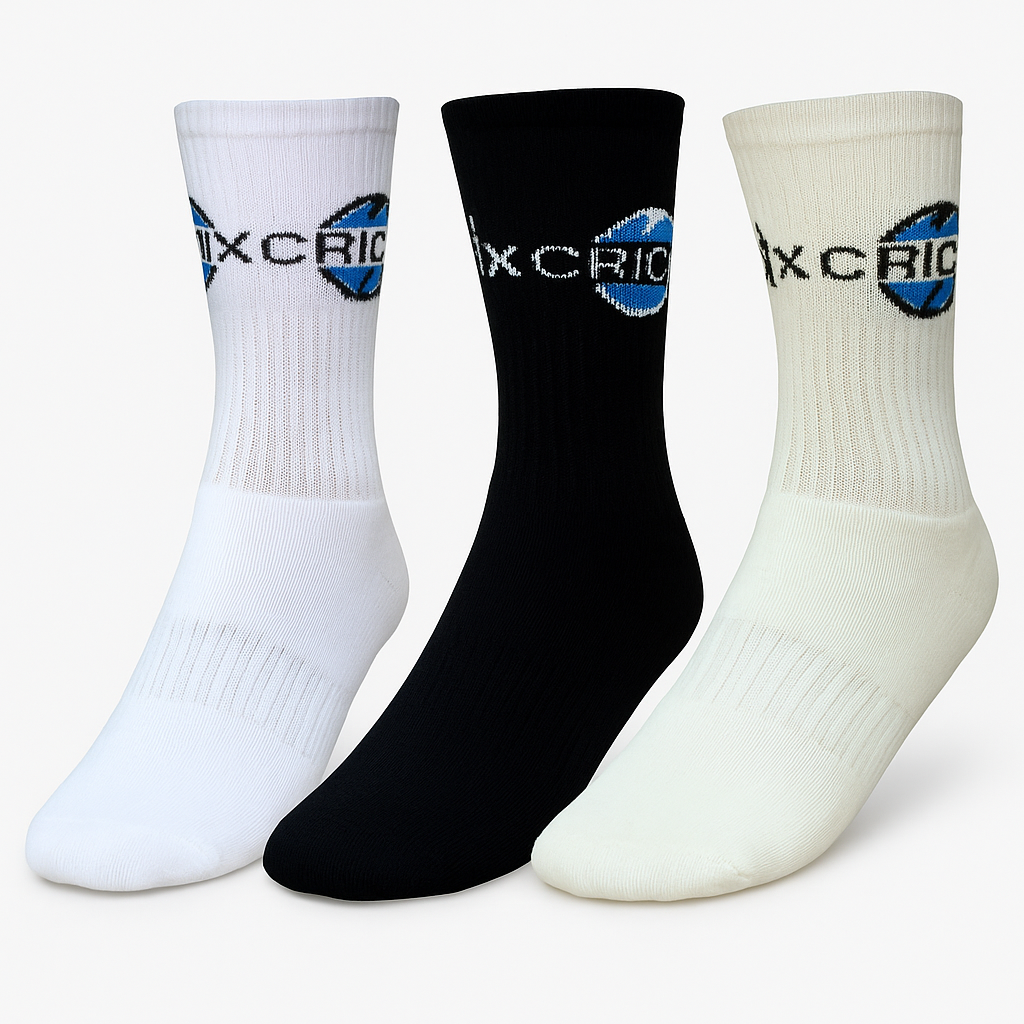 Cricnix sports socks in white, black, and cream with Cricnix branding, displayed on a white background.